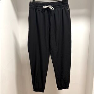 Vuori Black Sweatpants with Elastic Waistband and Tapered Ankles